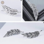 Boucles d'oreilles country avec plumes en argent élégant
