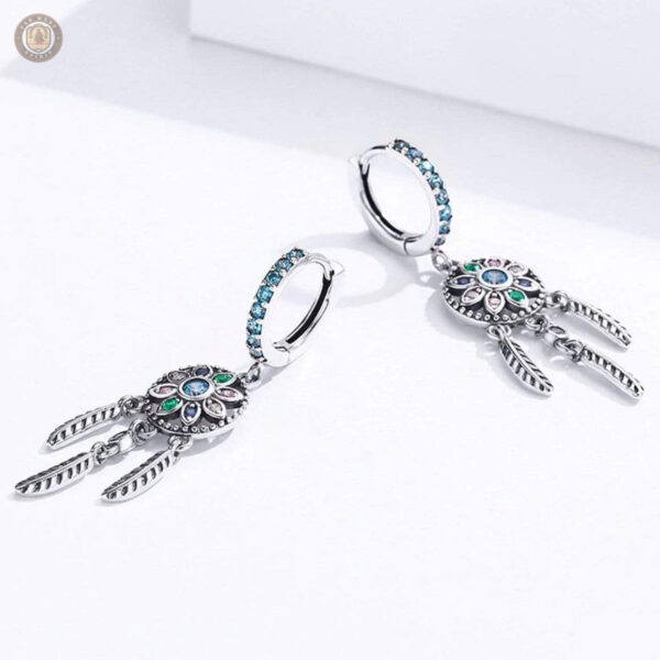 Boucles d'oreilles country avec design attrape-rêves turquoise