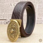Boucle western en métal sur ceinture camel