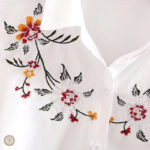 Vêtement western féminin avec broderies florales élégantes
