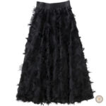 Jupe noire mi-longue au style western élégant