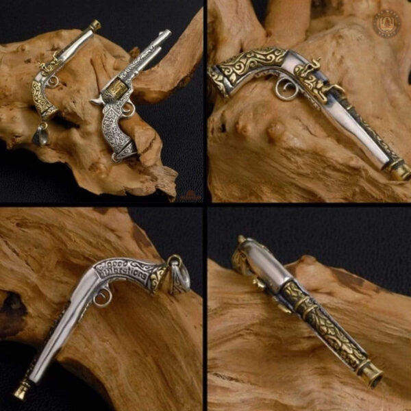 Bijou en argent représentant un revolver, touche vintage