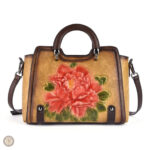 Sac à main motif floral avec détails colorés